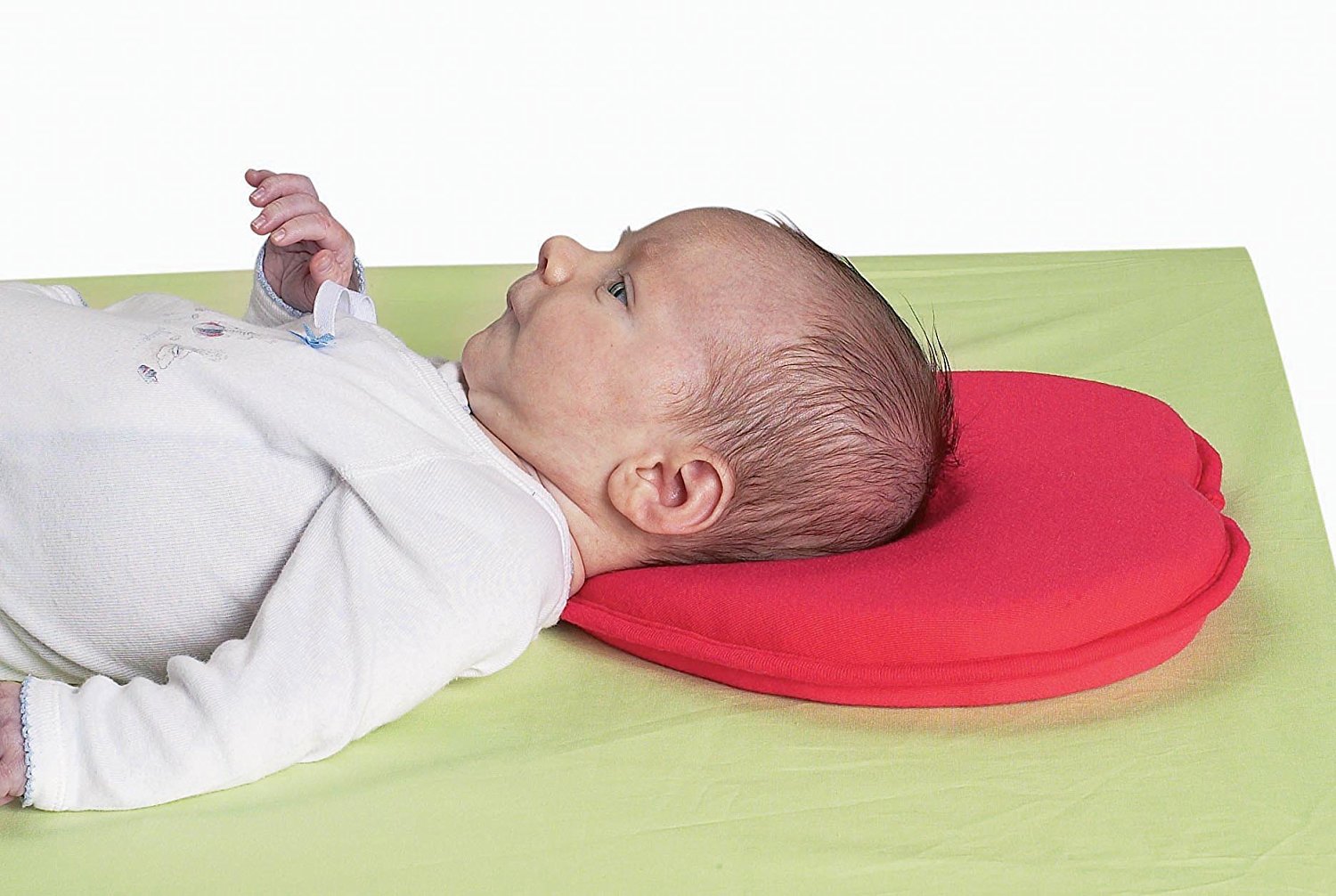 Можно новорожденному спать на подушке. Подушка для новорожденных. Ортопедическая подушка для младенцев. Подушка для грудного ребенка. Голова на подушке.