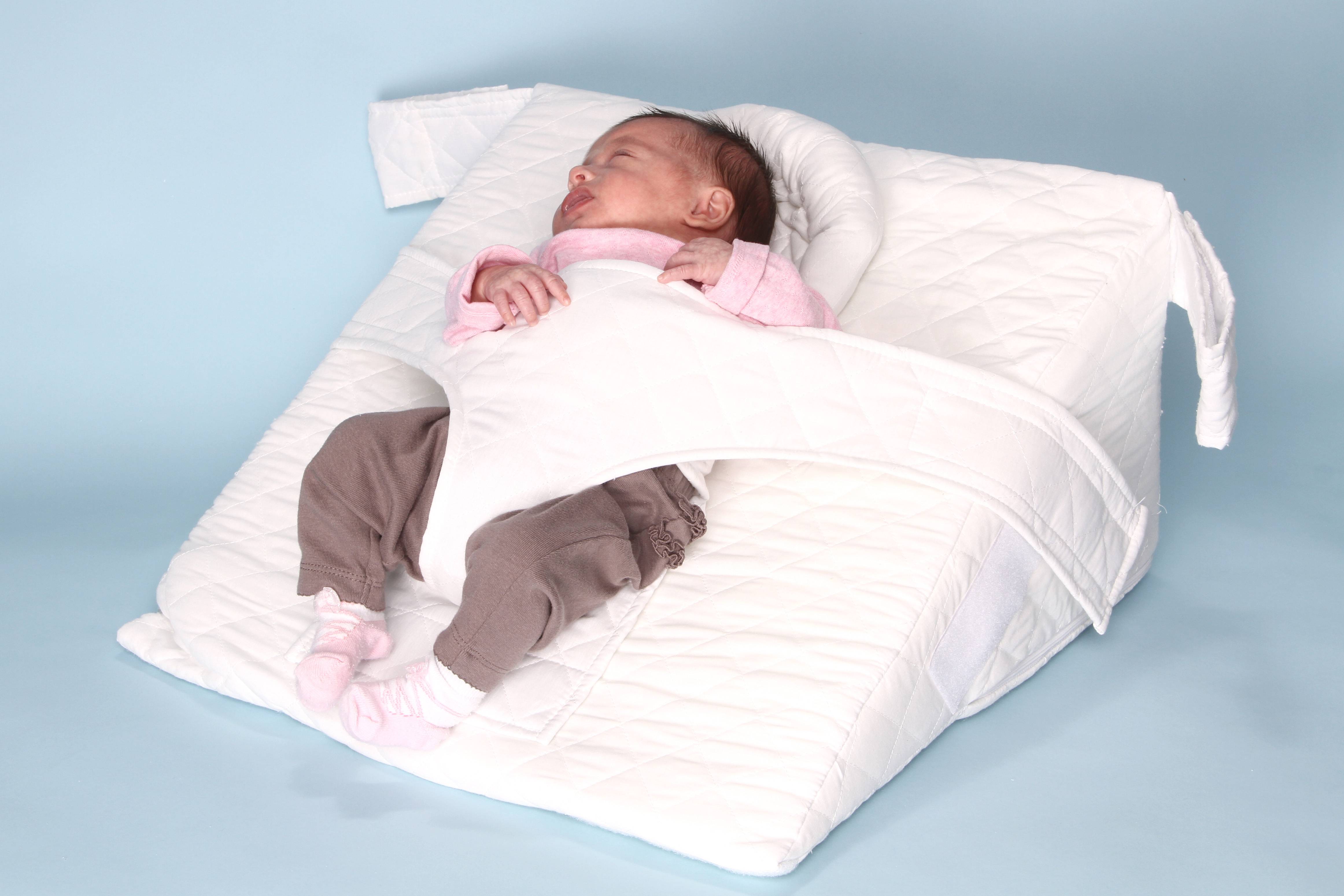 Подушка для сна новорожденного на боку